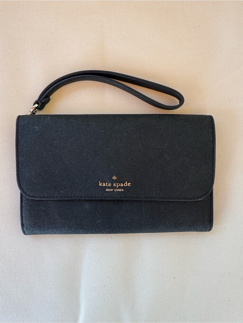 kate spade black and gold wristlet clutch